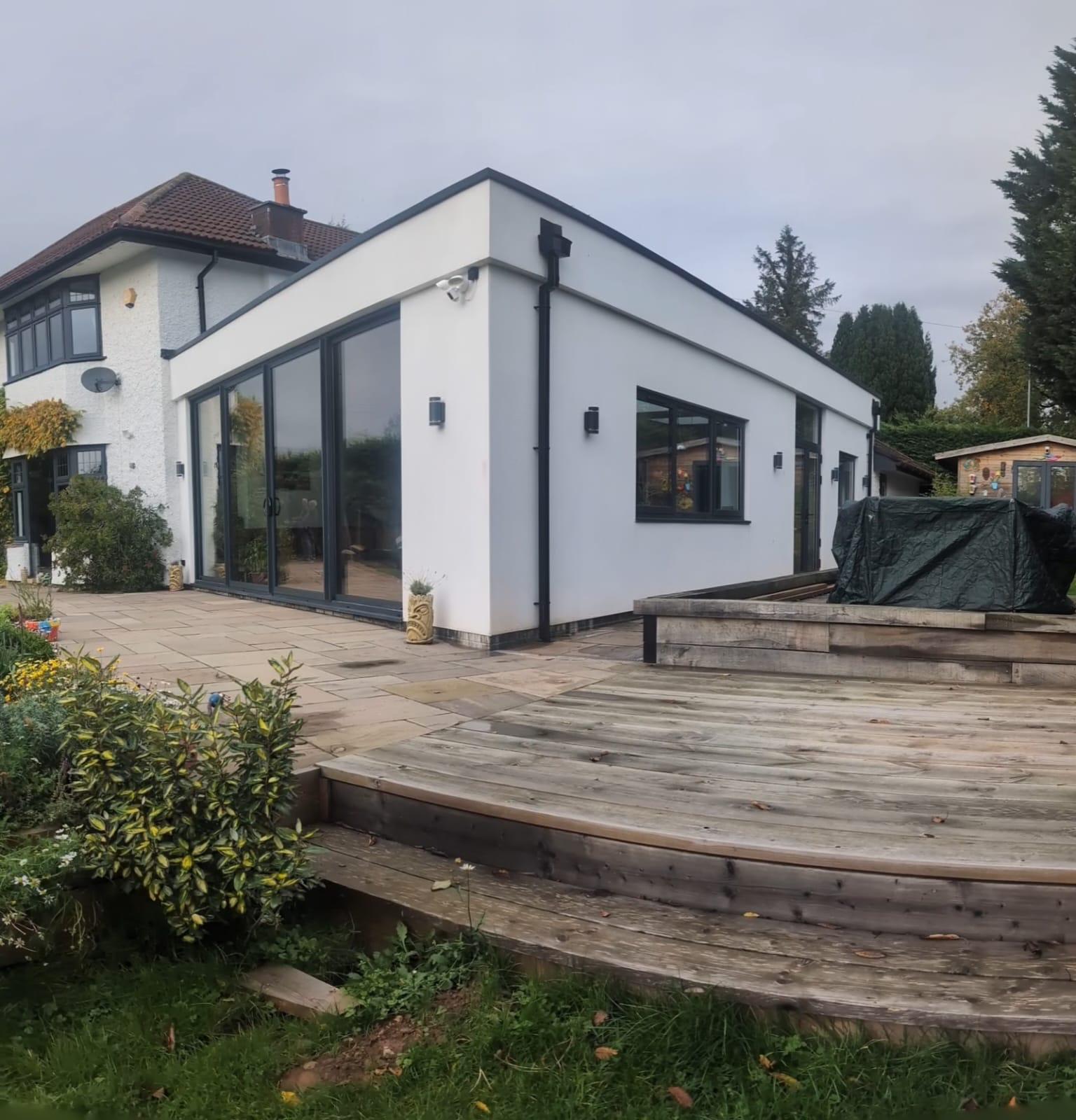 Aluminium Bi-folds installation by Essential Glazing Products