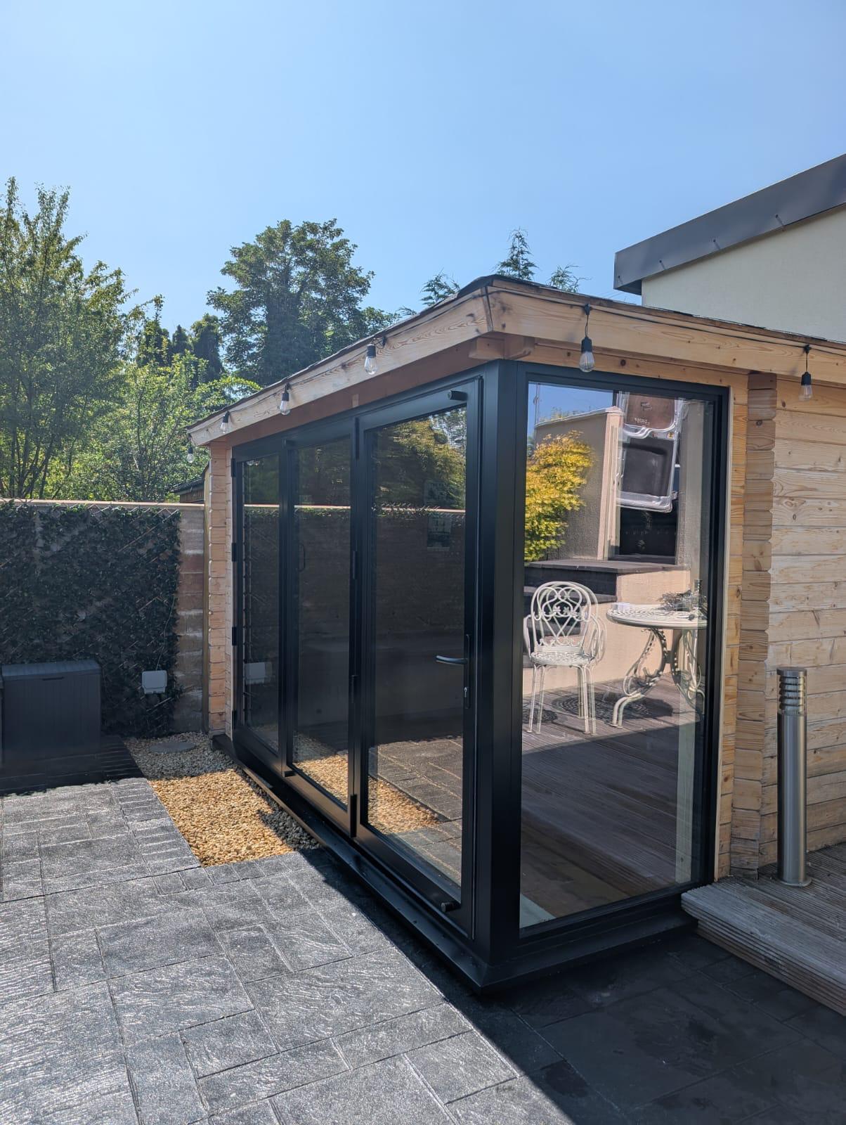 Aluminium Bi-folds installation by Essential Glazing Products
