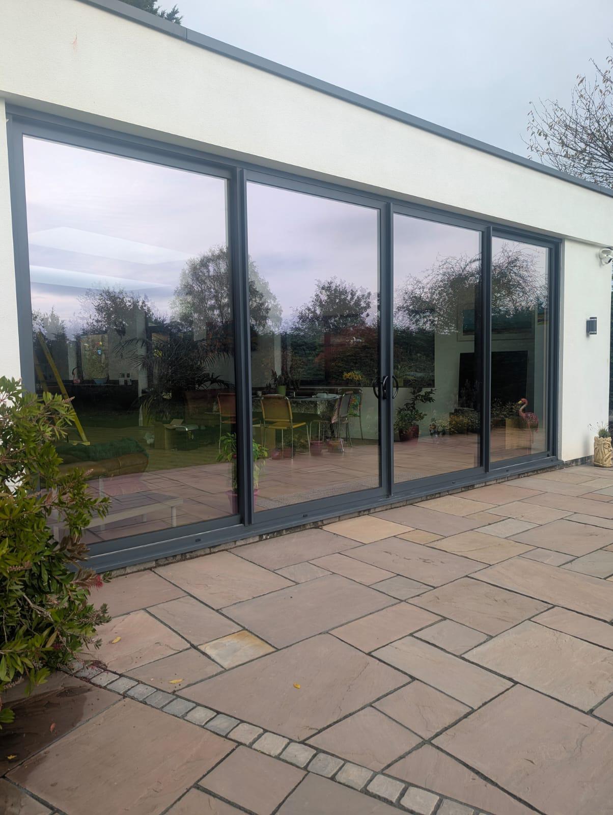 Aluminium Sliding Doors installation by Essential Glazing Products