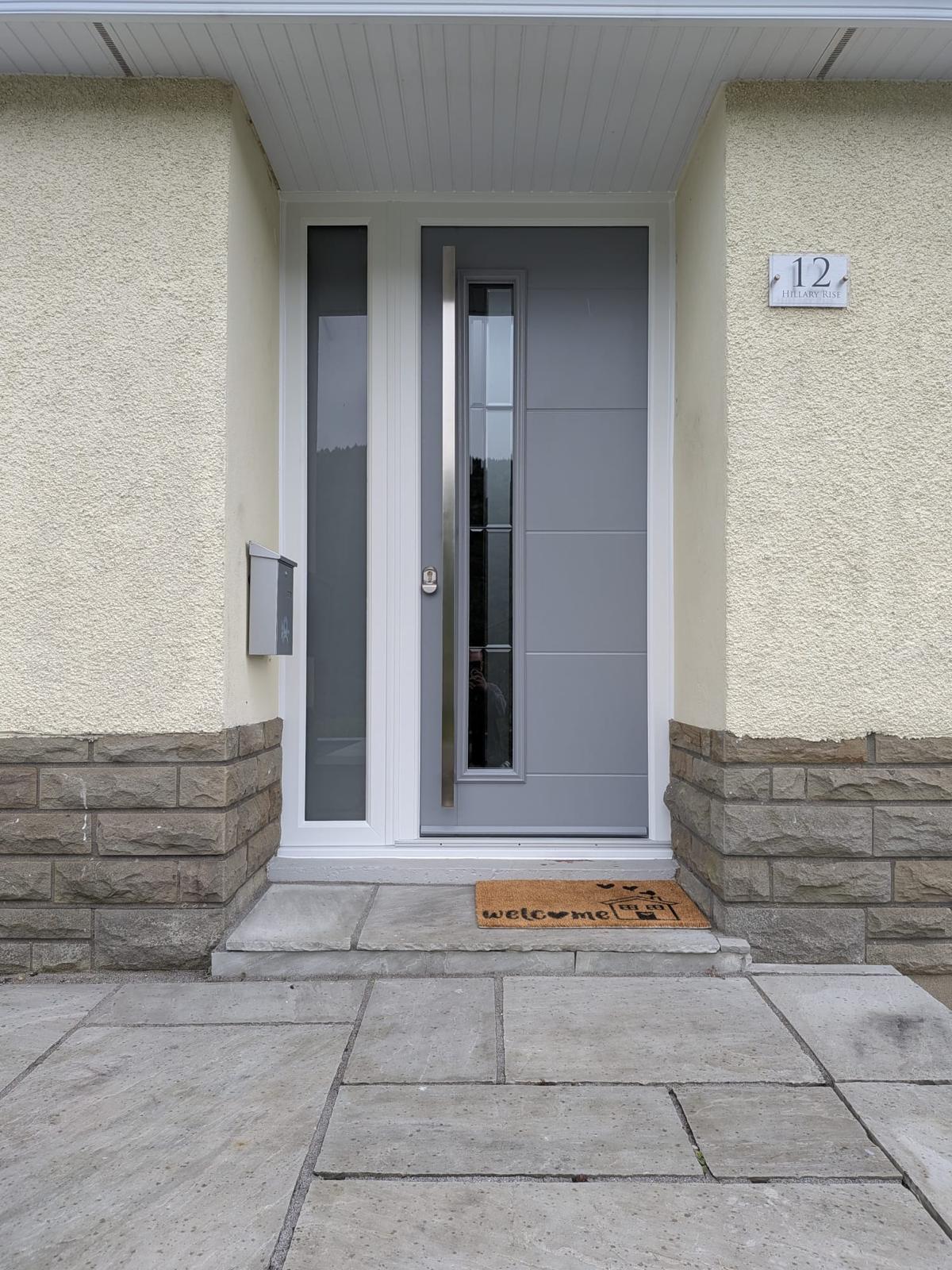 Aluminium Doors installation by Essential Glazing Products