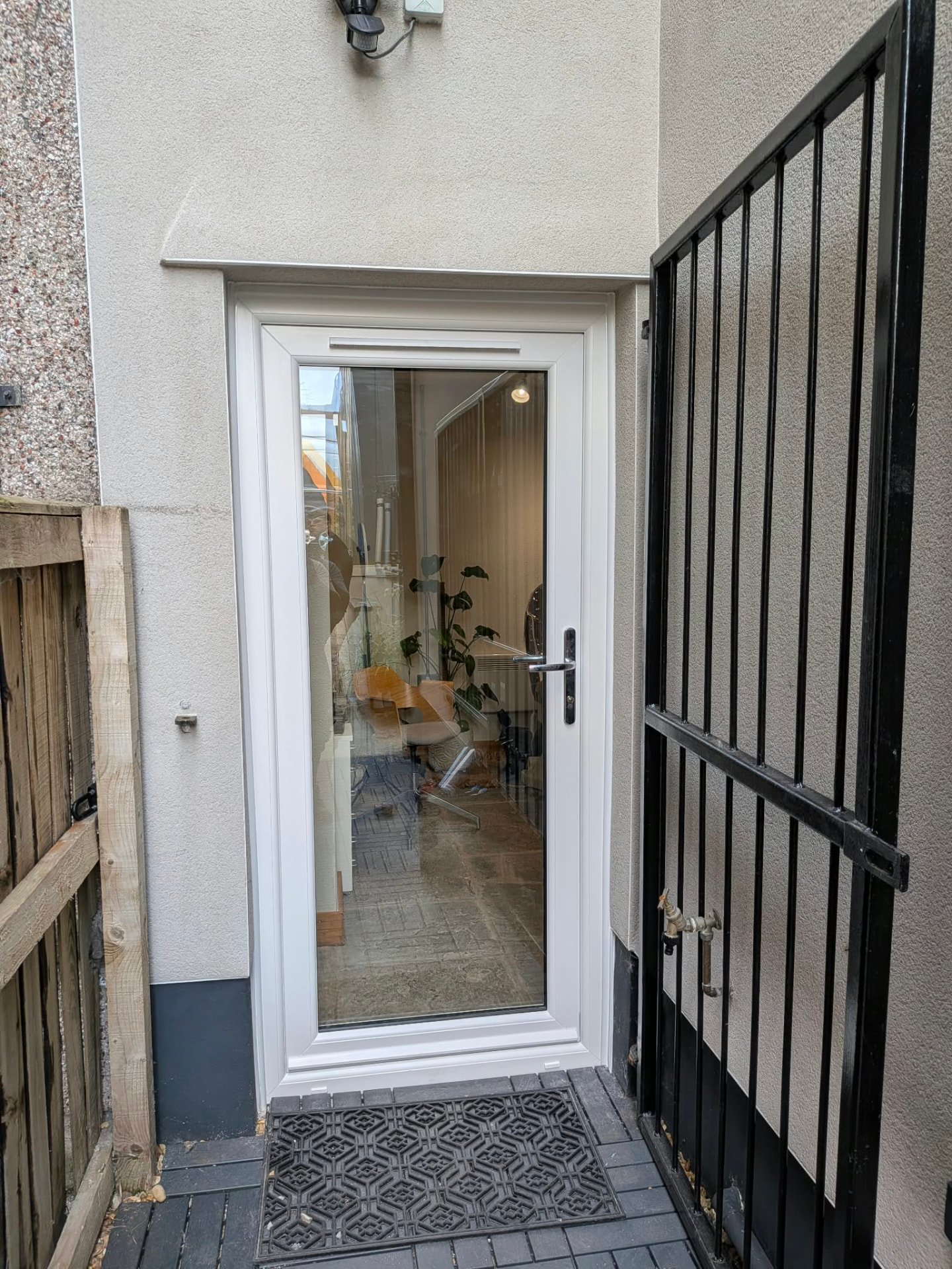 White uPVC rear door by Essential Glazing Products