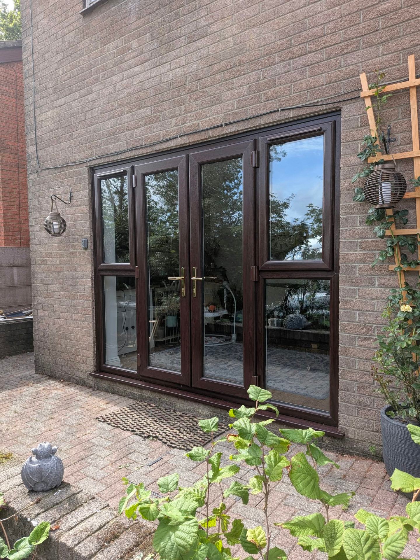 Rosewood uPVC French doors by Essential Glazing Products