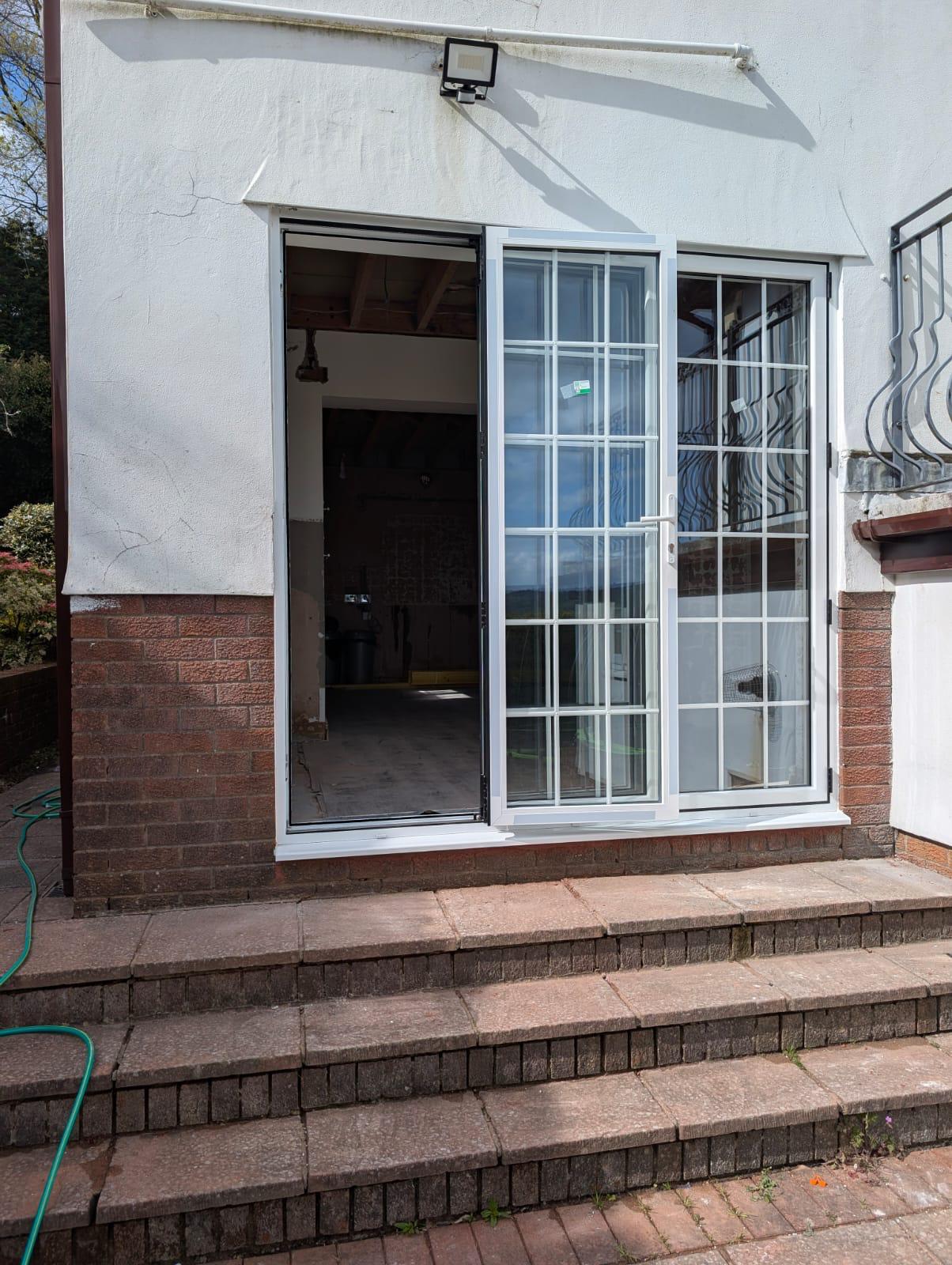 uPVC Bi-folds installation by Essential Glazing Products