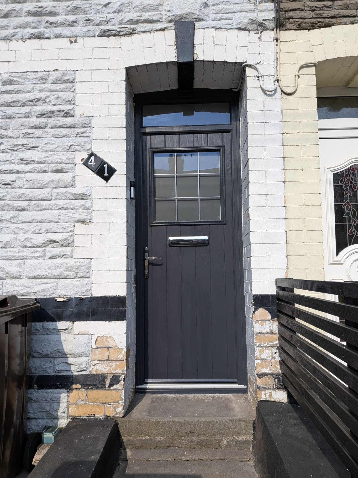 Anthracite grey composite front door by Essential Glazing Products