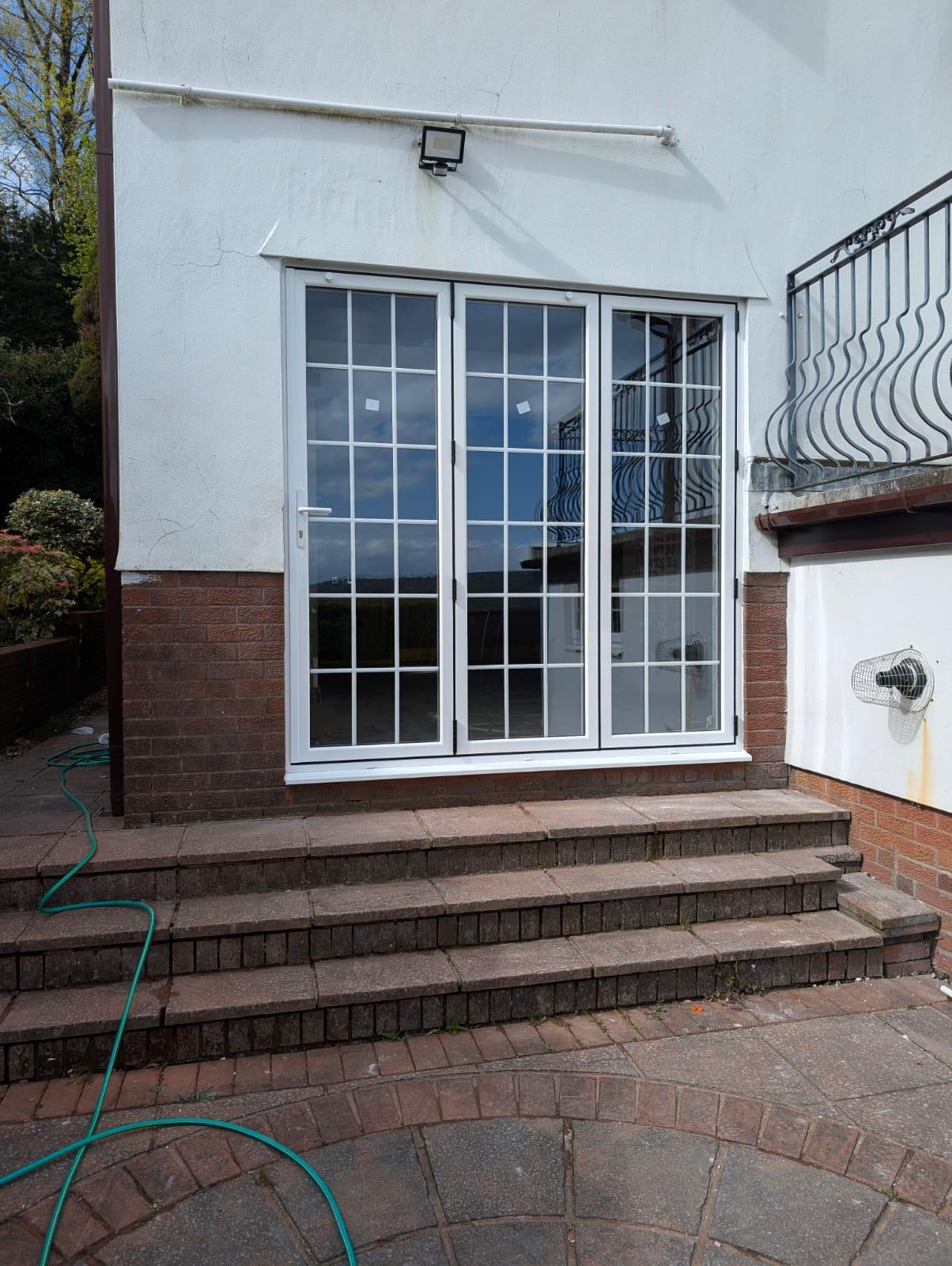 uPVC Bi-folds installation by Essential Glazing Products
