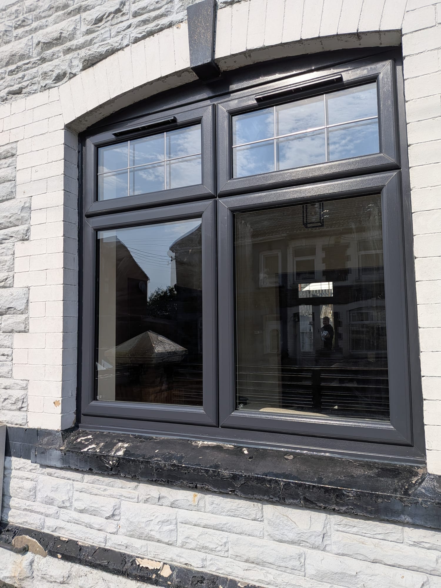 Anthracite grey uPVC window by Essential Glazing Products